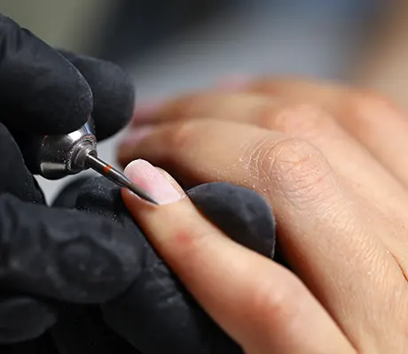Preparing the nail bed and cuticles